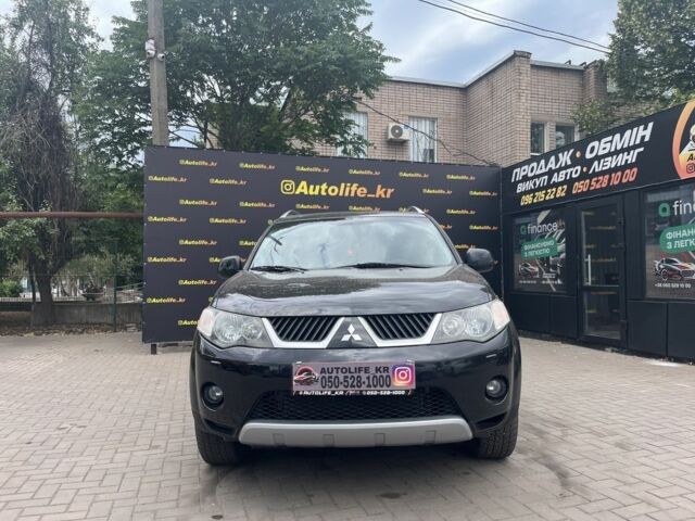 Черный Мицубиси Аутлендер, объемом двигателя 3 л и пробегом 235 тыс. км за 9800 $, фото 1 на Automoto.ua