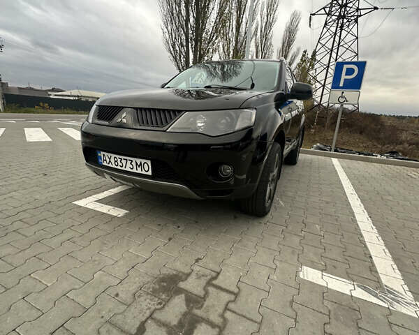 Чорний Міцубісі Аутлендер, об'ємом двигуна 2.4 л та пробігом 218 тис. км за 10000 $, фото 12 на Automoto.ua