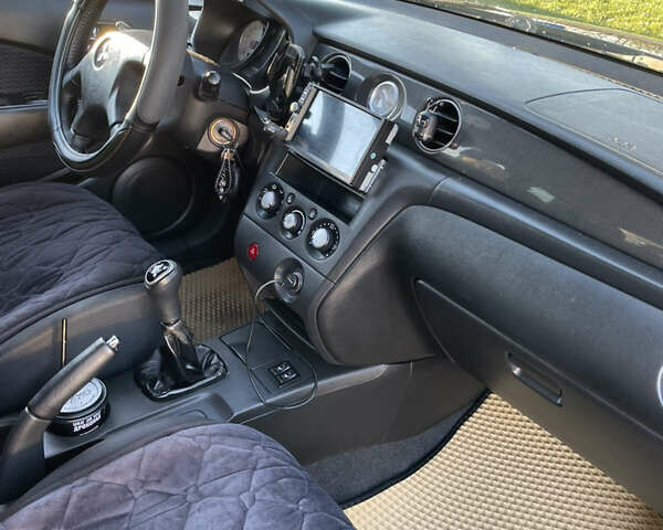 Чорний Міцубісі Аутлендер, об'ємом двигуна 2 л та пробігом 218 тис. км за 6300 $, фото 9 на Automoto.ua