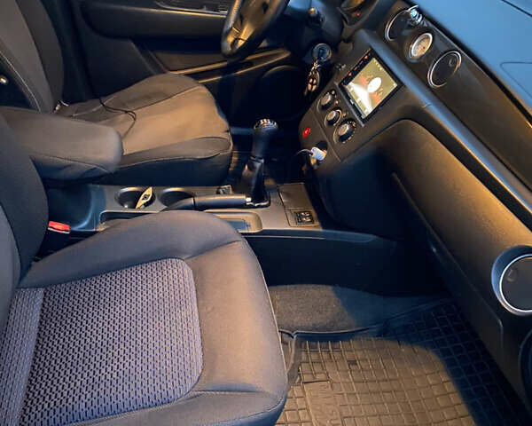 Чорний Міцубісі Аутлендер, об'ємом двигуна 2 л та пробігом 271 тис. км за 6799 $, фото 7 на Automoto.ua