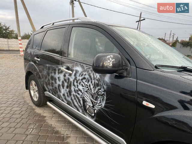 Міцубісі Аутлендер 2008 у Кременчуге на Automoto.ua Чорний Міцубісі Аутлендер, об'ємом двигуна 2.4 л та пробігом 230 тис. км за 6650 $, фото 61 на Automoto.ua