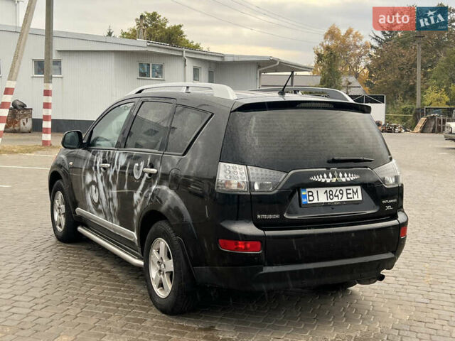 Мицубиси Аутлендер 2008 в Кременчуге на Automoto.ua Черный Мицубиси Аутлендер, объемом двигателя 2.4 л и пробегом 230 тыс. км за 6850 $, фото 25 на Automoto.ua