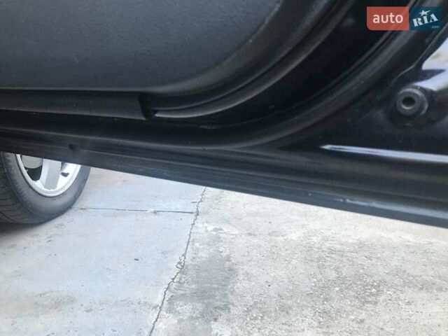 Чорний Міцубісі Аутлендер, об'ємом двигуна 2.38 л та пробігом 207 тис. км за 7000 $, фото 75 на Automoto.ua
