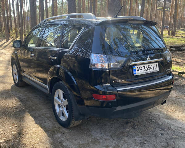 Чорний Міцубісі Аутлендер, об'ємом двигуна 3 л та пробігом 227 тис. км за 7400 $, фото 5 на Automoto.ua