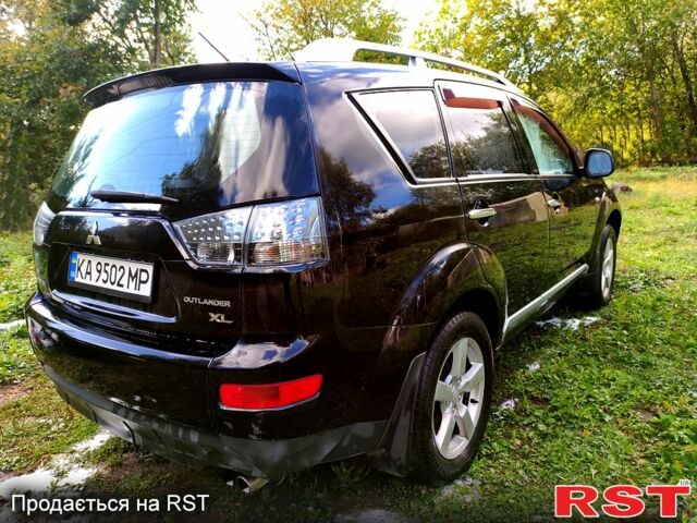 Чорний Міцубісі Аутлендер, об'ємом двигуна 3 л та пробігом 284 тис. км за 10000 $, фото 1 на Automoto.ua