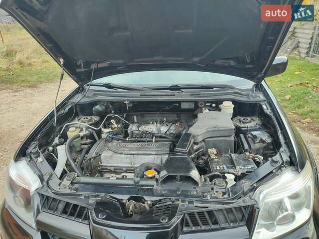 Міцубісі Аутлендер 2008 у Івано-Франківську на Automoto.ua Чорний Міцубісі Аутлендер, об'ємом двигуна 2 л та пробігом 128 тис. км за 7000 $, фото 10 на Automoto.ua