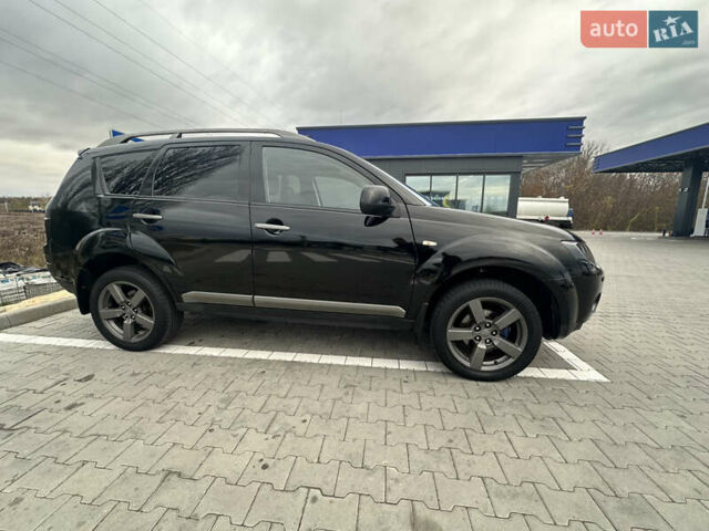 Чорний Міцубісі Аутлендер, об'ємом двигуна 2.4 л та пробігом 218 тис. км за 10000 $, фото 10 на Automoto.ua
