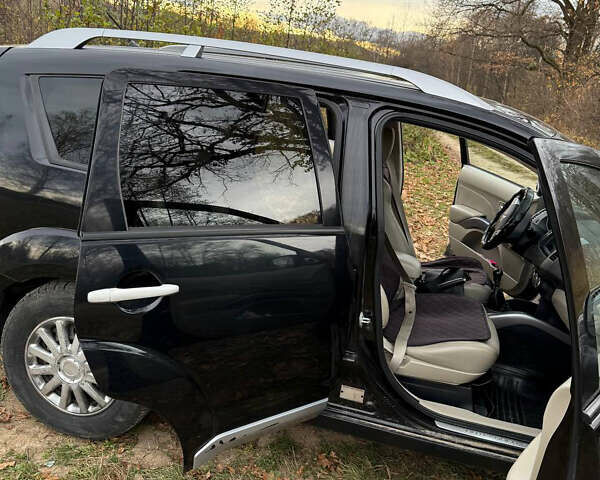 Черный Мицубиси Аутлендер, объемом двигателя 2.18 л и пробегом 233 тыс. км за 9600 $, фото 7 на Automoto.ua