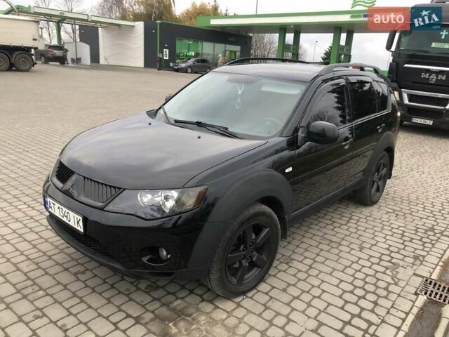Чорний Міцубісі Аутлендер, об'ємом двигуна 2.4 л та пробігом 199 тис. км за 8999 $, фото 6 на Automoto.ua