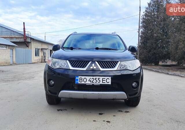 Чорний Міцубісі Аутлендер, об'ємом двигуна 2.2 л та пробігом 275 тис. км за 9900 $, фото 1 на Automoto.ua