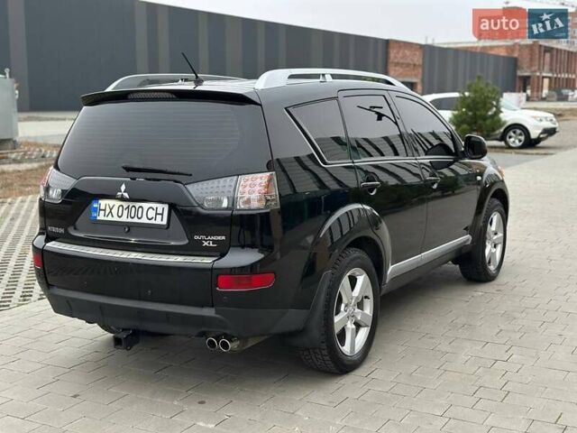 Черный Мицубиси Аутлендер, объемом двигателя 3 л и пробегом 248 тыс. км за 9800 $, фото 25 на Automoto.ua