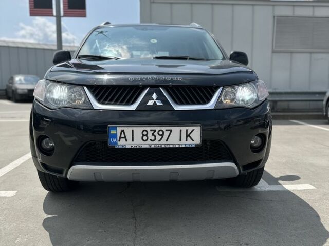 Чорний Міцубісі Аутлендер, об'ємом двигуна 2.4 л та пробігом 137 тис. км за 8700 $, фото 1 на Automoto.ua