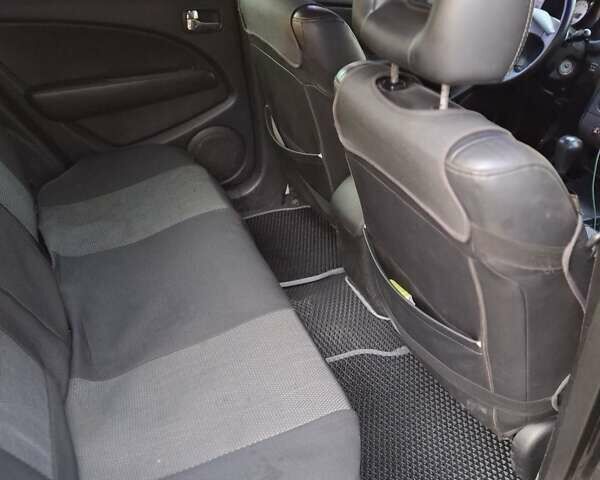 Чорний Міцубісі Аутлендер, об'ємом двигуна 2.38 л та пробігом 245 тис. км за 6800 $, фото 4 на Automoto.ua