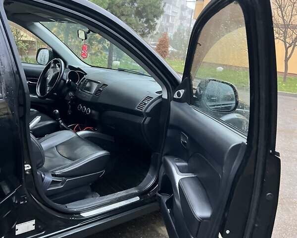 Чорний Міцубісі Аутлендер, об'ємом двигуна 2 л та пробігом 330 тис. км за 4900 $, фото 9 на Automoto.ua