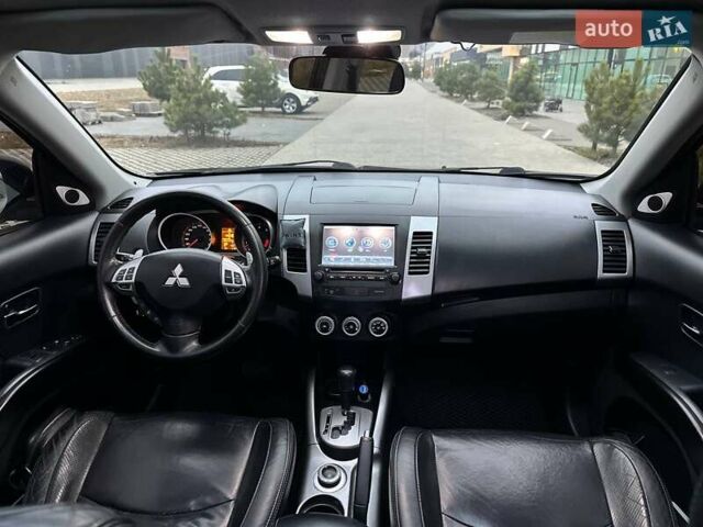 Черный Мицубиси Аутлендер, объемом двигателя 3 л и пробегом 248 тыс. км за 9800 $, фото 46 на Automoto.ua
