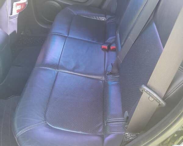 Чорний Міцубісі Аутлендер, об'ємом двигуна 2.38 л та пробігом 161 тис. км за 7500 $, фото 1 на Automoto.ua