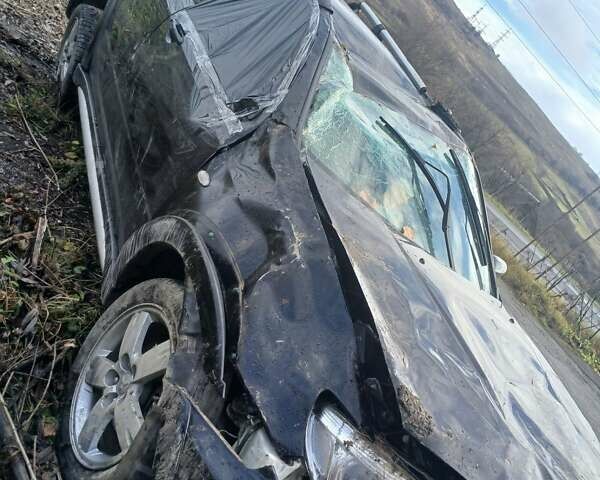 Черный Мицубиси Аутлендер, объемом двигателя 2.38 л и пробегом 270 тыс. км за 1700 $, фото 4 на Automoto.ua