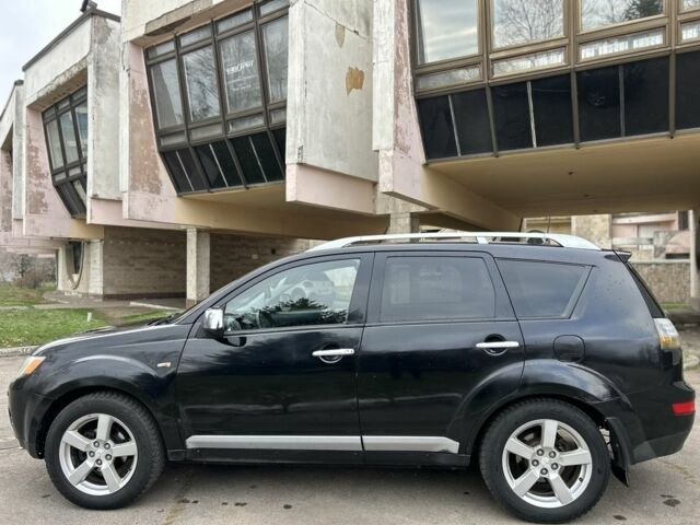 Чорний Міцубісі Аутлендер, об'ємом двигуна 2 л та пробігом 238 тис. км за 5500 $, фото 6 на Automoto.ua