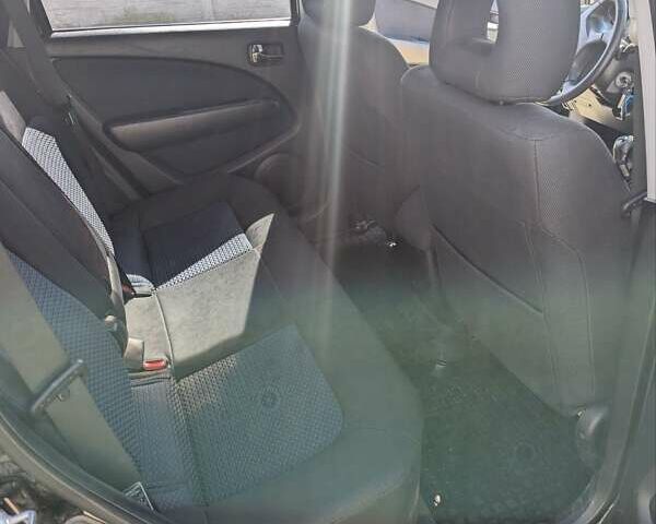 Черный Мицубиси Аутлендер, объемом двигателя 2 л и пробегом 189 тыс. км за 7100 $, фото 1 на Automoto.ua