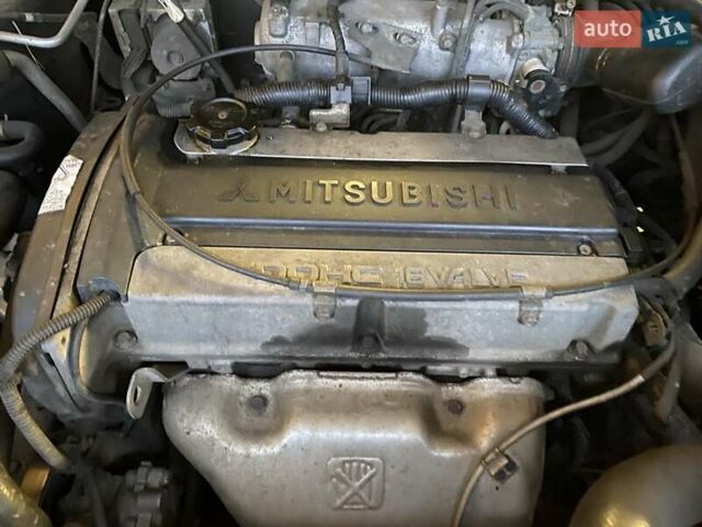 Черный Мицубиси Аутлендер, объемом двигателя 2 л и пробегом 306 тыс. км за 6500 $, фото 24 на Automoto.ua