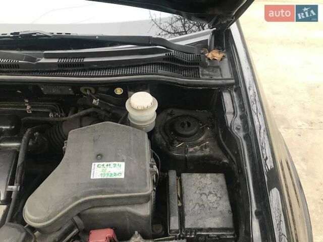 Чорний Міцубісі Аутлендер, об'ємом двигуна 2.38 л та пробігом 207 тис. км за 7000 $, фото 31 на Automoto.ua