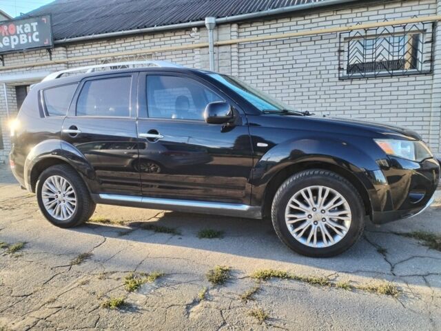 Черный Мицубиси Аутлендер, объемом двигателя 2.4 л и пробегом 199 тыс. км за 9000 $, фото 2 на Automoto.ua
