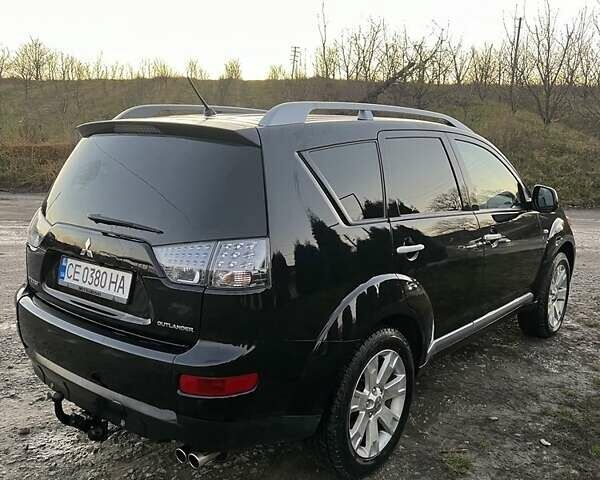 Черный Мицубиси Аутлендер, объемом двигателя 2.2 л и пробегом 310 тыс. км за 9700 $, фото 3 на Automoto.ua