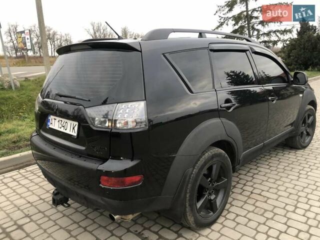 Чорний Міцубісі Аутлендер, об'ємом двигуна 2.4 л та пробігом 199 тис. км за 8999 $, фото 5 на Automoto.ua
