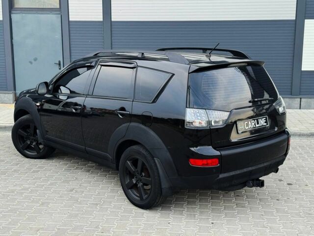 Черный Мицубиси Аутлендер, объемом двигателя 2.4 л и пробегом 199 тыс. км за 6470 $, фото 2 на Automoto.ua