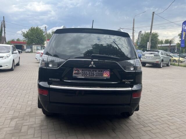 Черный Мицубиси Аутлендер, объемом двигателя 3 л и пробегом 235 тыс. км за 9800 $, фото 4 на Automoto.ua
