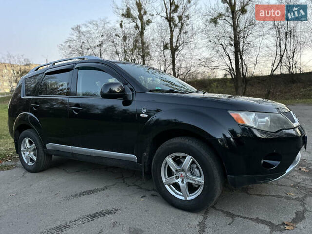 Чорний Міцубісі Аутлендер, об'ємом двигуна 1.97 л та пробігом 300 тис. км за 8600 $, фото 2 на Automoto.ua