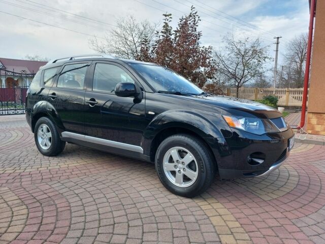 Черный Мицубиси Аутлендер, объемом двигателя 2 л и пробегом 249 тыс. км за 8750 $, фото 19 на Automoto.ua