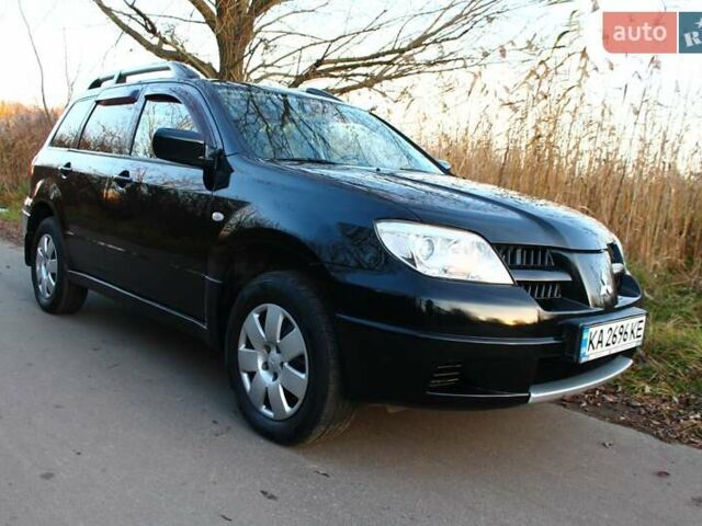 Черный Мицубиси Аутлендер, объемом двигателя 2 л и пробегом 189 тыс. км за 7200 $, фото 17 на Automoto.ua