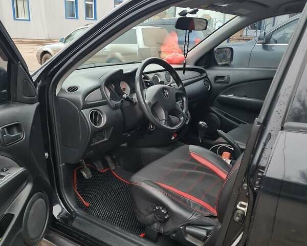 Черный Мицубиси Аутлендер, объемом двигателя 2 л и пробегом 212 тыс. км за 7900 $, фото 3 на Automoto.ua