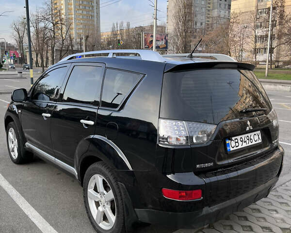 Черный Мицубиси Аутлендер, объемом двигателя 2.4 л и пробегом 237 тыс. км за 5000 $, фото 6 на Automoto.ua