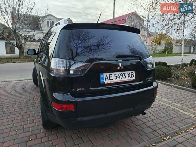 Черный Мицубиси Аутлендер, объемом двигателя 2.36 л и пробегом 192 тыс. км за 8800 $, фото 16 на Automoto.ua