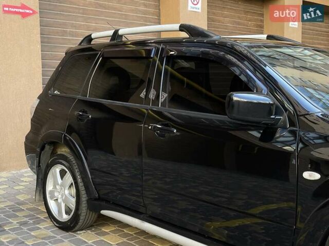 Черный Мицубиси Аутлендер, объемом двигателя 2 л и пробегом 270 тыс. км за 7199 $, фото 9 на Automoto.ua