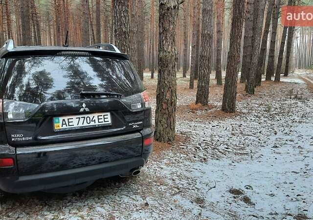 Чорний Міцубісі Аутлендер, об'ємом двигуна 2.4 л та пробігом 228 тис. км за 10400 $, фото 4 на Automoto.ua
