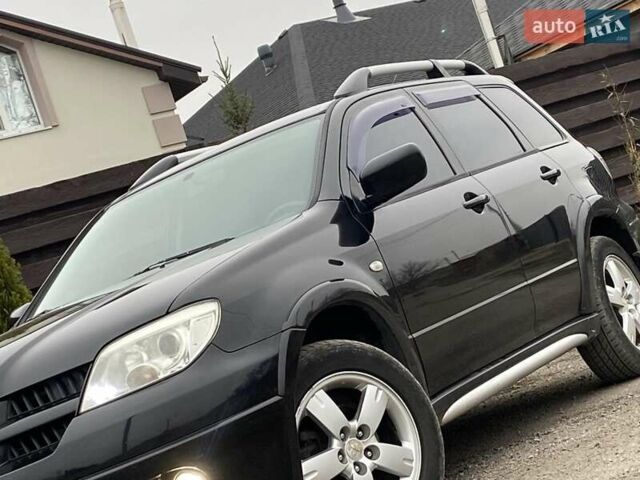 Черный Мицубиси Аутлендер, объемом двигателя 2.4 л и пробегом 178 тыс. км за 6900 $, фото 10 на Automoto.ua