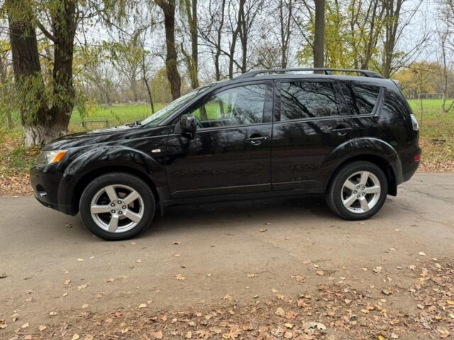 Чорний Міцубісі Аутлендер, об'ємом двигуна 3 л та пробігом 212 тис. км за 10000 $, фото 2 на Automoto.ua