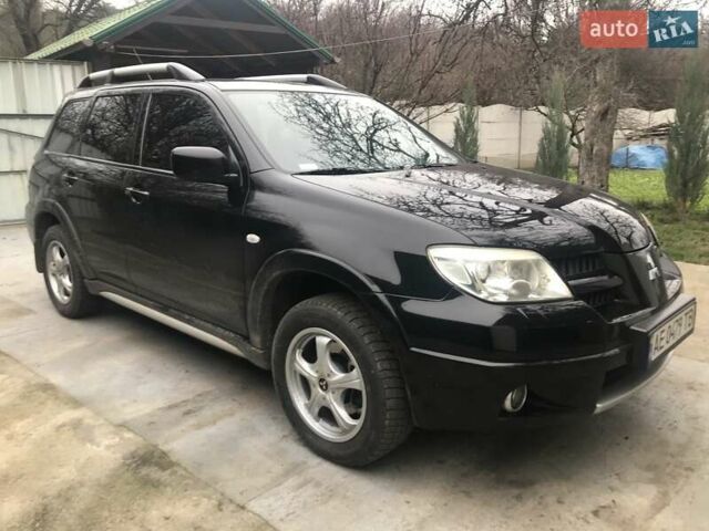 Чорний Міцубісі Аутлендер, об'ємом двигуна 2.38 л та пробігом 207 тис. км за 7000 $, фото 15 на Automoto.ua