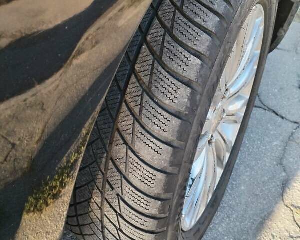 Черный Мицубиси Аутлендер, объемом двигателя 2.4 л и пробегом 199 тыс. км за 9000 $, фото 2 на Automoto.ua