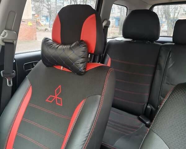 Черный Мицубиси Аутлендер, объемом двигателя 2 л и пробегом 212 тыс. км за 7900 $, фото 9 на Automoto.ua