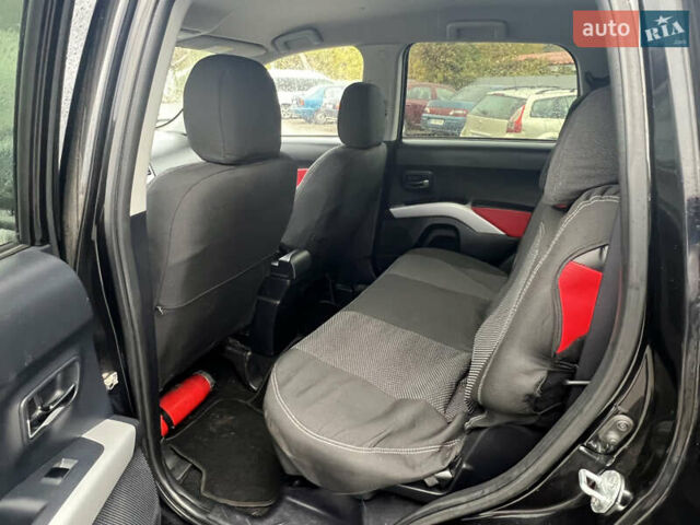 Черный Мицубиси Аутлендер, объемом двигателя 2.4 л и пробегом 230 тыс. км за 6650 $, фото 43 на Automoto.ua