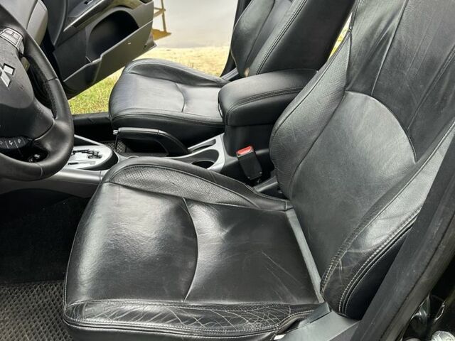 Чорний Міцубісі Аутлендер, об'ємом двигуна 2.4 л та пробігом 186 тис. км за 8700 $, фото 9 на Automoto.ua