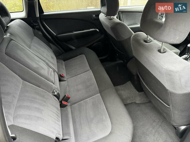 Чорний Міцубісі Аутлендер, об'ємом двигуна 2 л та пробігом 254 тис. км за 7499 $, фото 11 на Automoto.ua