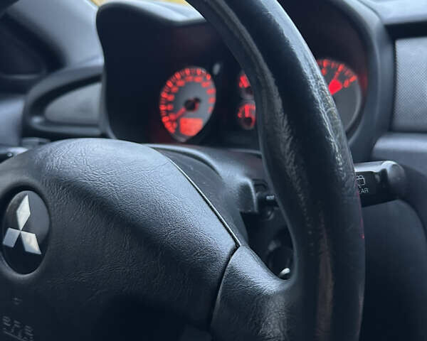 Мицубиси Аутлендер 2008 в Киеве на Automoto.ua Черный Мицубиси Аутлендер, объемом двигателя 2 л и пробегом 245 тыс. км за 5900 $, фото 12 на Automoto.ua