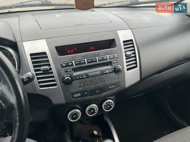 Черный Мицубиси Аутлендер, объемом двигателя 2.4 л и пробегом 230 тыс. км за 6650 $, фото 34 на Automoto.ua