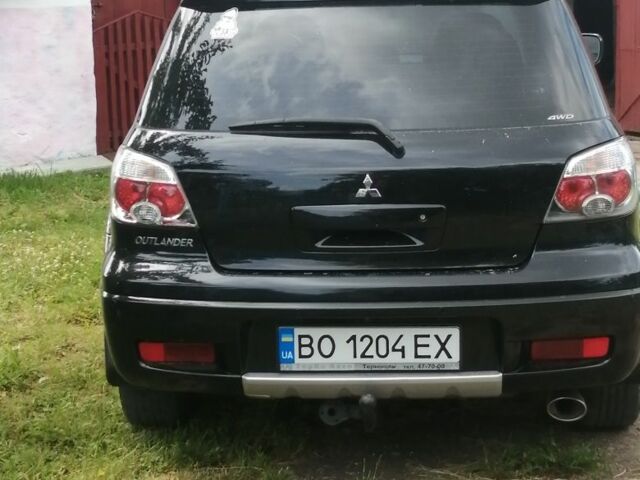Чорний Міцубісі Аутлендер, об'ємом двигуна 2 л та пробігом 208 тис. км за 6700 $, фото 7 на Automoto.ua