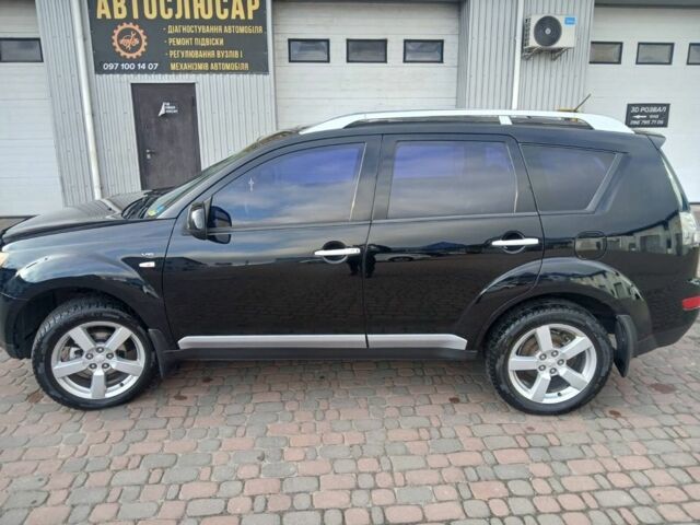 Чорний Міцубісі Аутлендер, об'ємом двигуна 3 л та пробігом 300 тис. км за 9600 $, фото 1 на Automoto.ua